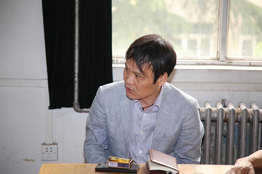 岳忠玉主持